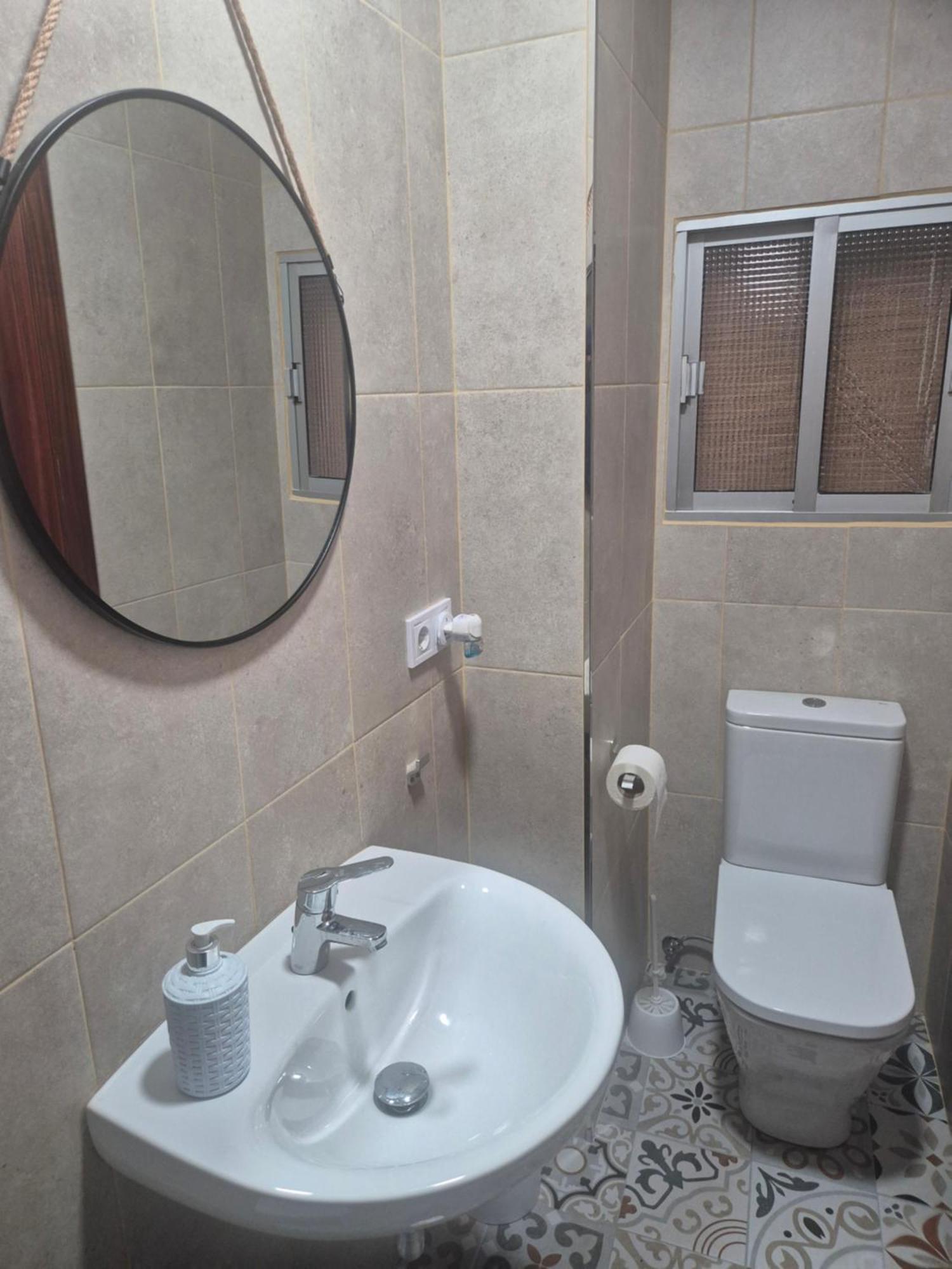 Quarto Quádruplo com Banheiro Compartilhado